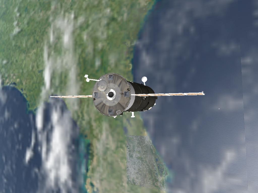 Approaching the OFSS (visible just under the right solar panel) as we pass over the KSC.