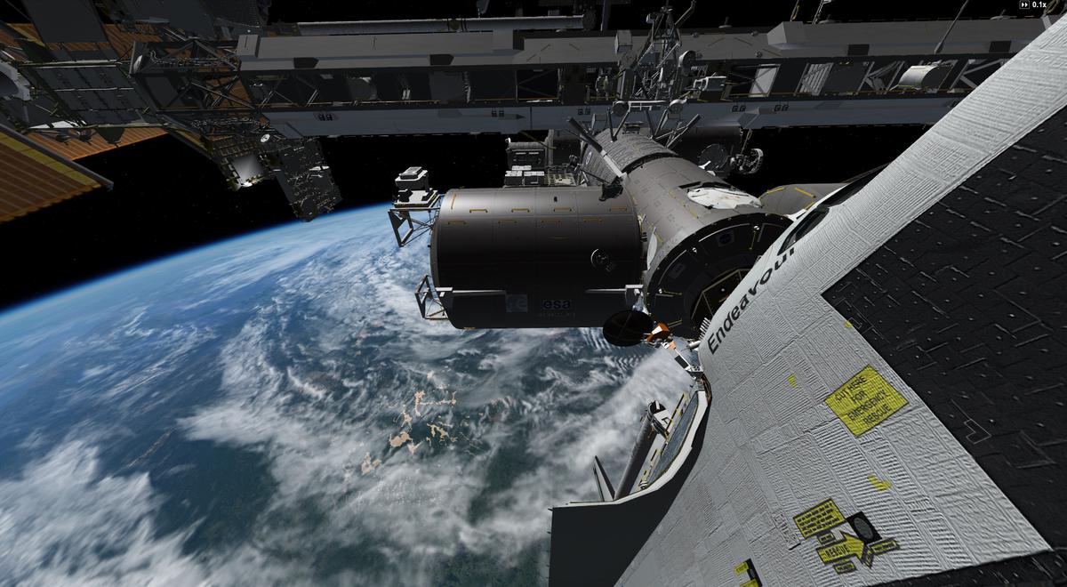 Wide angle view of Endeavour docked to the ISS